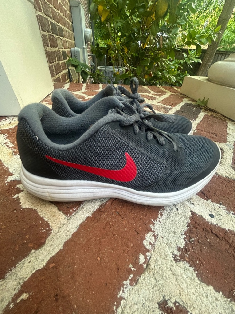 Nike Dark Gray Mesh Trainers with Red Swoosh Kids Size 5Y